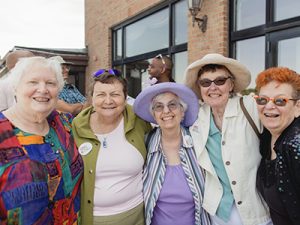 Four women posing for a picture